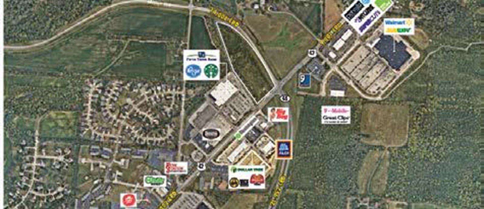 Aerial map view of commercial and residential areas along US Route 42 with parking lots and buildings.