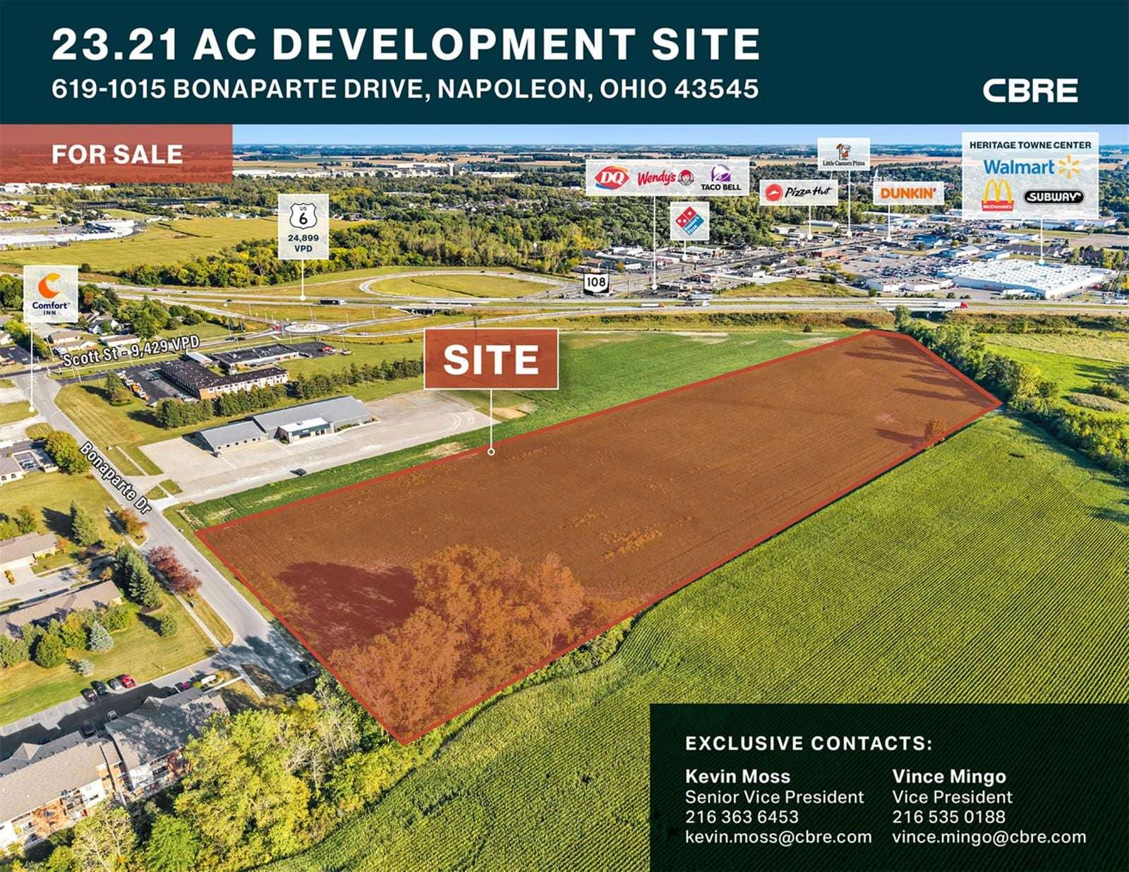 Aerial view of 23.21-acre development site in Napoleon, Ohio with surrounding commercial properties.