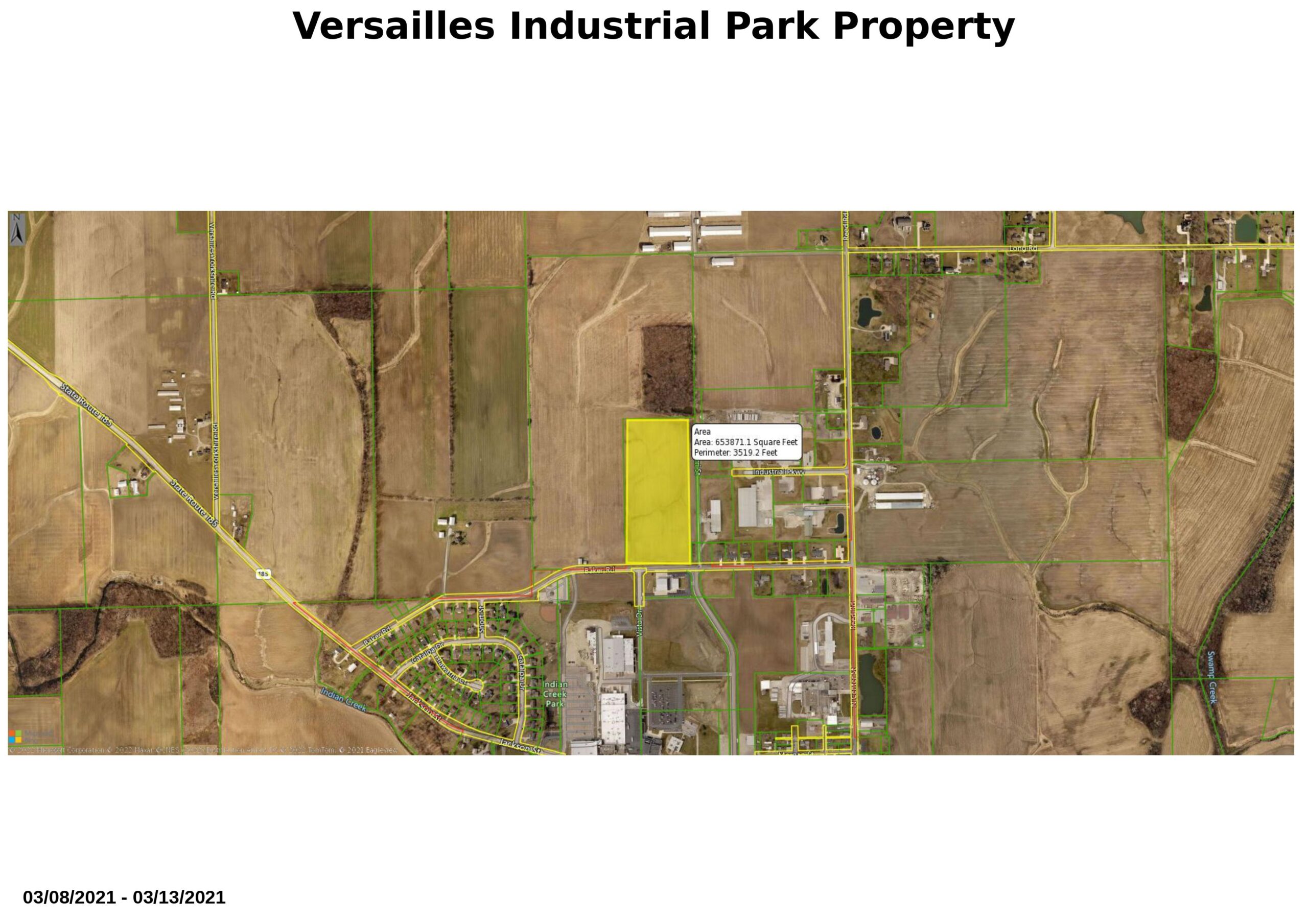 Aerial map of Versailles Industrial Park Property showing buildings and highlighted yellow land parcel among surrounding fields.
