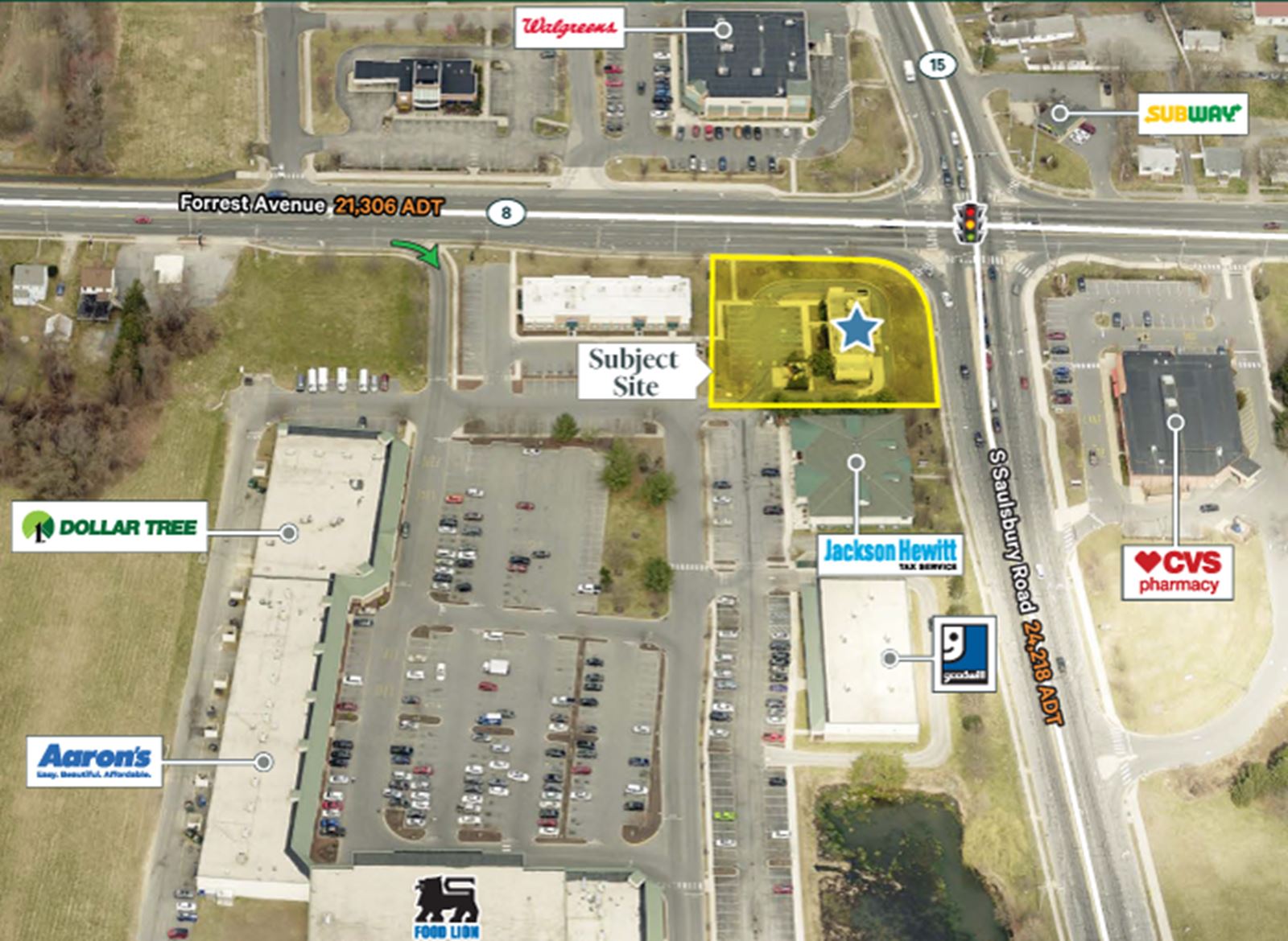 Aerial map view of commercial shopping center with Dollar Tree, Aarons, and other retail stores along a main road.